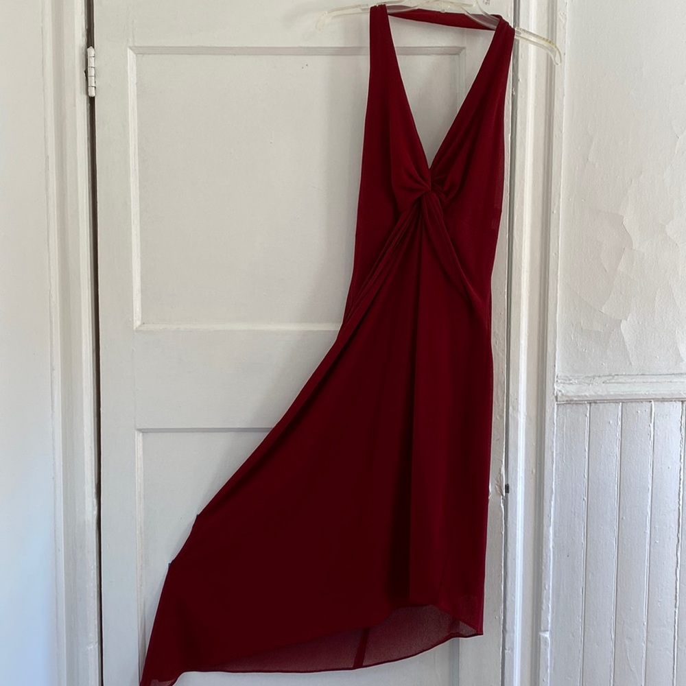 Halter dress diagonally cut hem line.
